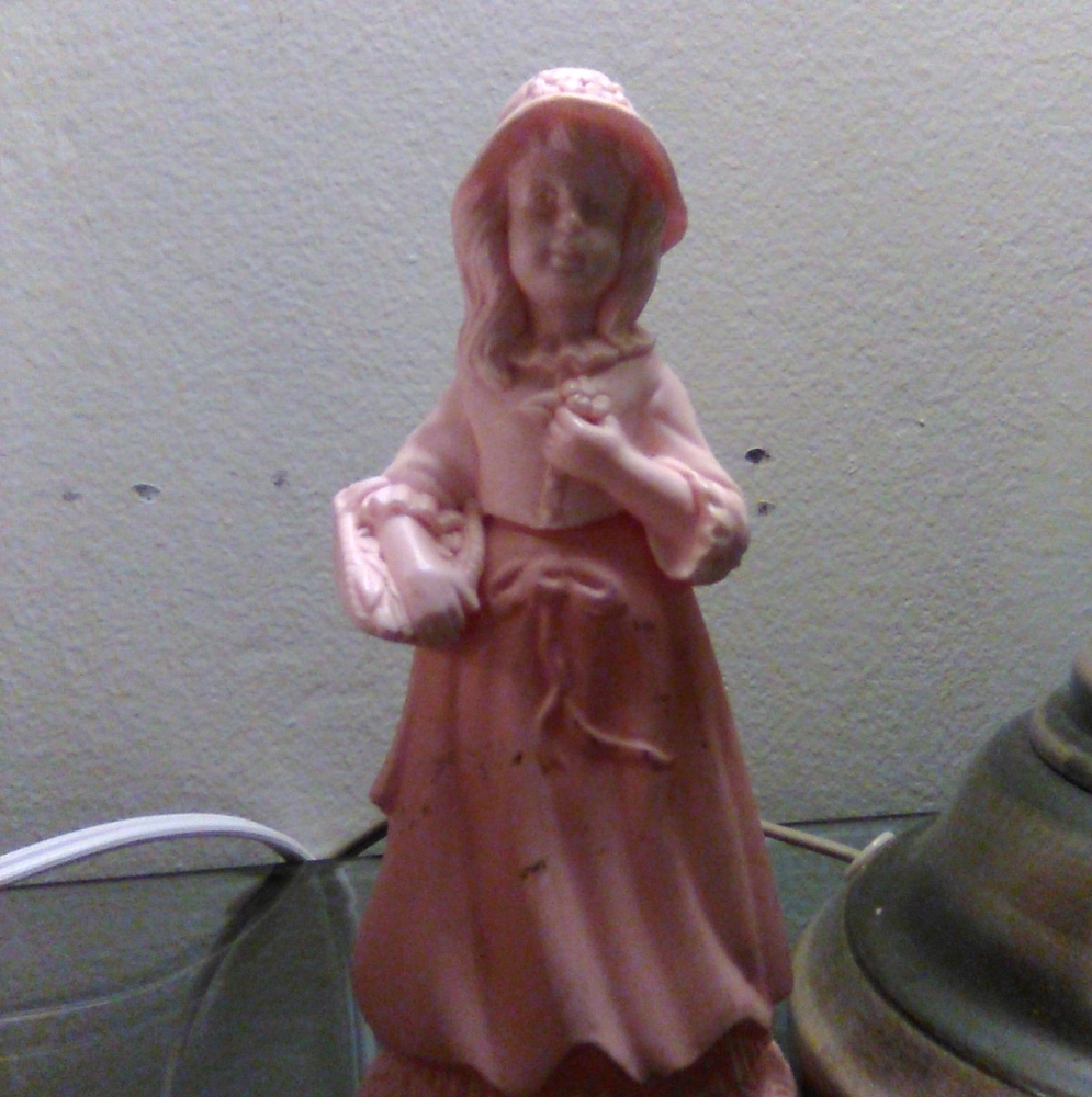 Avon fragrance figurine